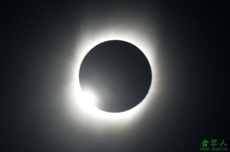 A total solar eclipse began its flight on Wednesday across a narrow path of Asia, where it was expected to darken the skies for millions of people for more than six minutes in some places.