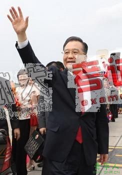 Chinese Premier Wen Jiabao waves to people seeing him off at the airport in Vientiane, Laos, on March 31, 2008. Premier Wen returned to Beijing on Monday after attending the third summit meeting of the Greater Mekong Subregion (GMS) in Vientiane.  (Xinhua Photo)